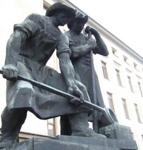 Statue of steelworkers outside AGH, Kraków, Poland