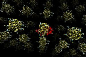 This illustration shows a lead sulfide quantum dot array. Each quantum dot (the colored clusters) is 'passivated' by molecules that bind to its surface. Dots that are made up of unequal amounts of lead and sulfur tend to cause electrons (shown in red) to become highly localized, which can substantially lower the electrical transport of the device. Image: Donghun Kim and Jeffrey C. Grossman.