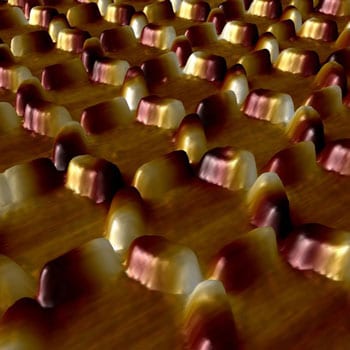 A 3-D depiction of the honeycomb artificial spin ice topography after the annealing and cooling protocols. The light and dark colors represent the north and south magnetic poles of the islands. Image: I. Gilbert, U. of I.
