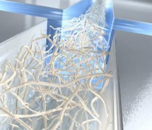 Artist's impression of the production of ultra-strong cellulose fibers: The cellulose nano fibrils flow through a water channel and become accelerated by the inflow of additional water jets from the sides. The acceleration lets all fibrils align with the direction of flow, finally locking together as a strong fiber. Image: DESY/Eberhard Reimann.