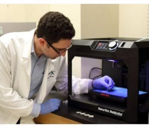 Jeffery Weisman, a doctoral student in Louisiana Tech University’s biomedical engineering program, uses a consumer-grade 3D printer and materials to create custom medical implant ‘beads’ that contain antibiotic and drug delivery properties.