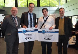 Winners of the poster prizes, from left to right: Prof. Dr. Martin Winter, Daniel Burow, Joern Wilhelm, and Prof. Dr. Dirk Uwe Sauer. 