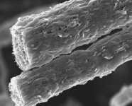 Mass production of polymer-nanotube composite fibers