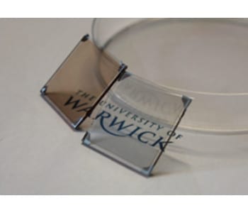 Transparent electrodes derived from copper and tungsten