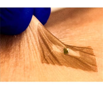 Data tattoos: integrating electronics onto human skin
