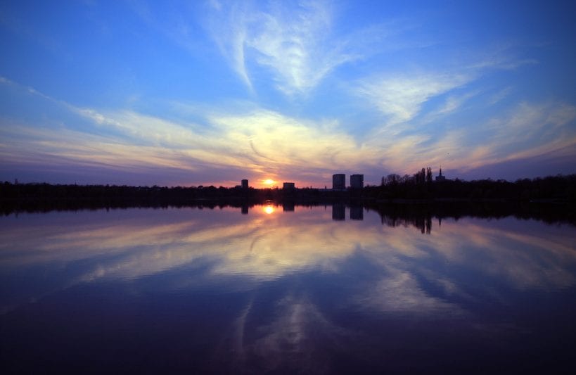 Mie scattering in sunset over city