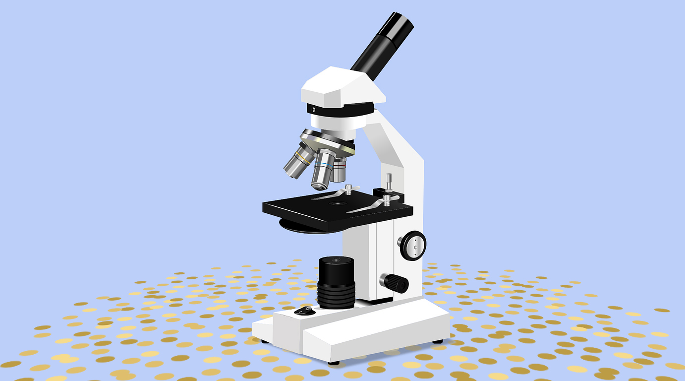 Microscope on blue background surrounded by confetti