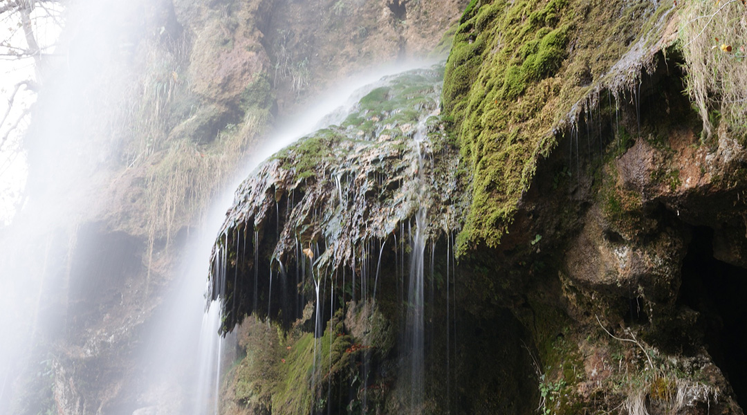 A mossy green waterfall