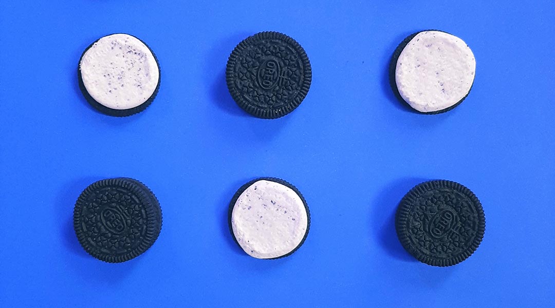 Oreo cookies in a blue background.