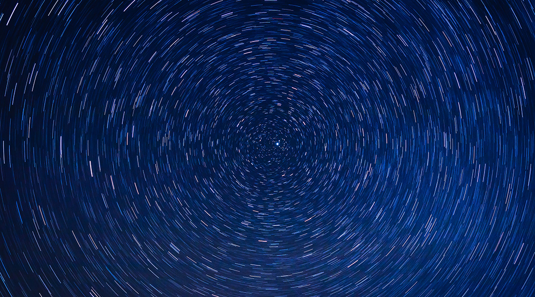 Time lapse of a starry night sky.