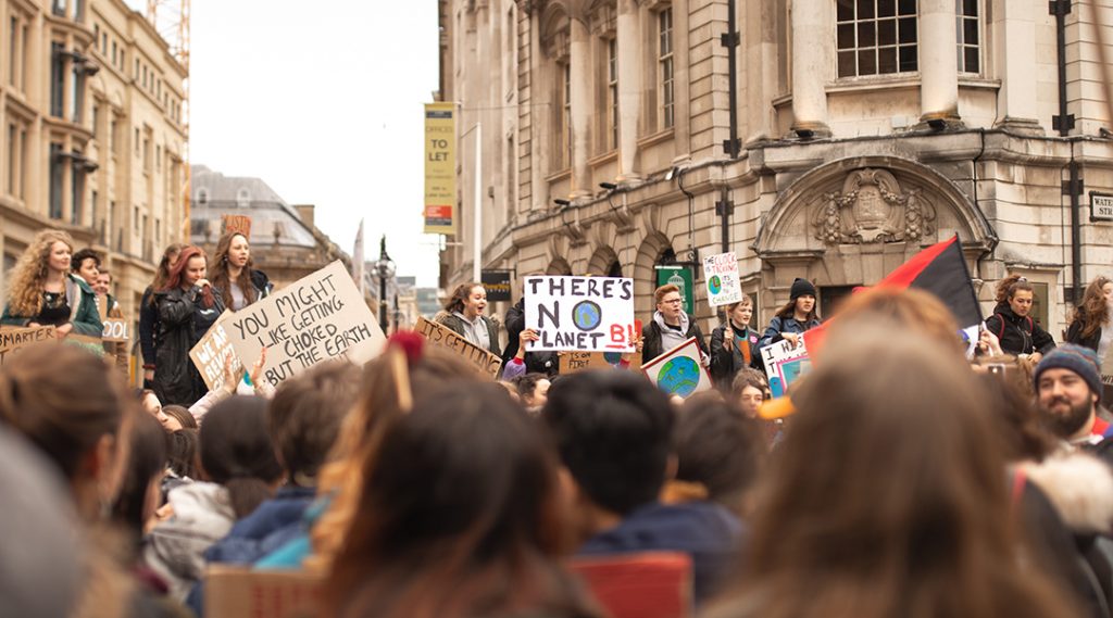 Crowd of people at a climate protest.