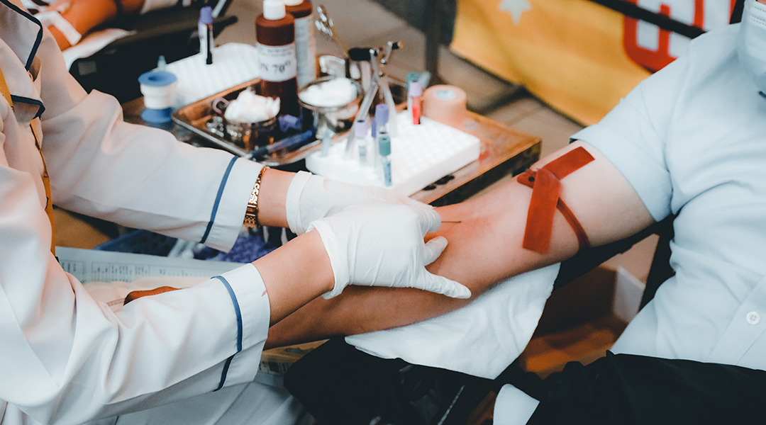 A person donating blood.