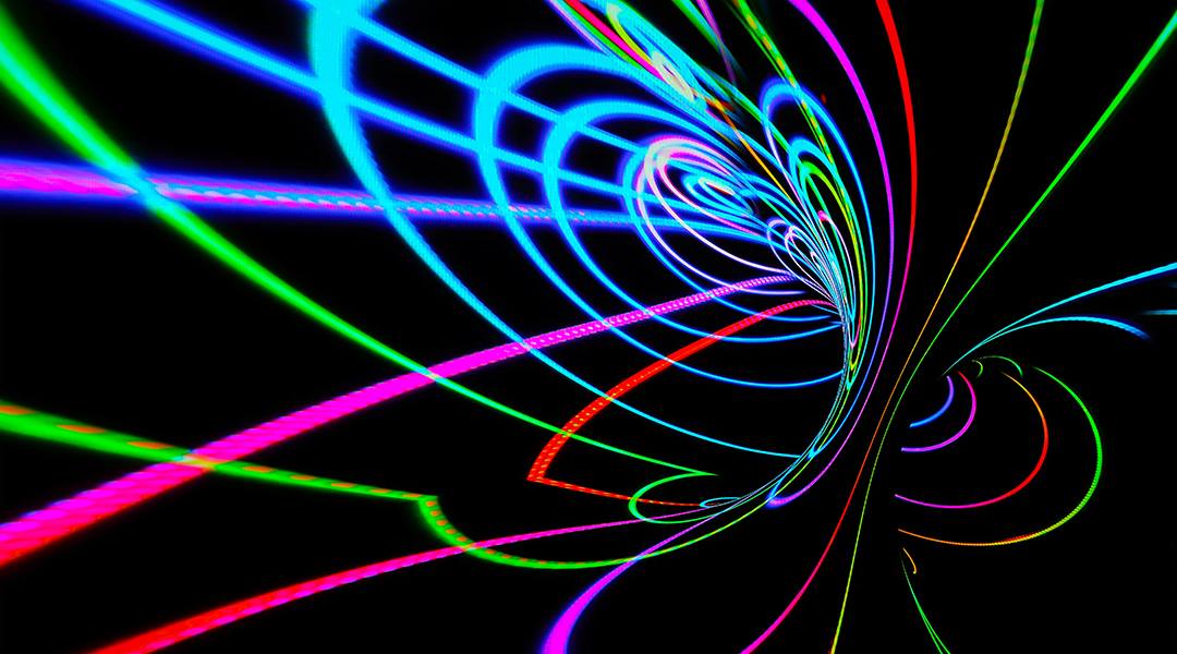 Abstract image of colored lines on a black background.