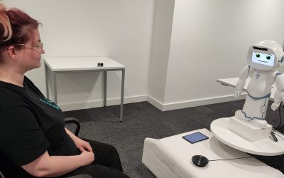 Robots can help improve workplace well-being, but only if we learn to connect with them