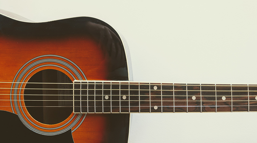 A guitar on a white background.