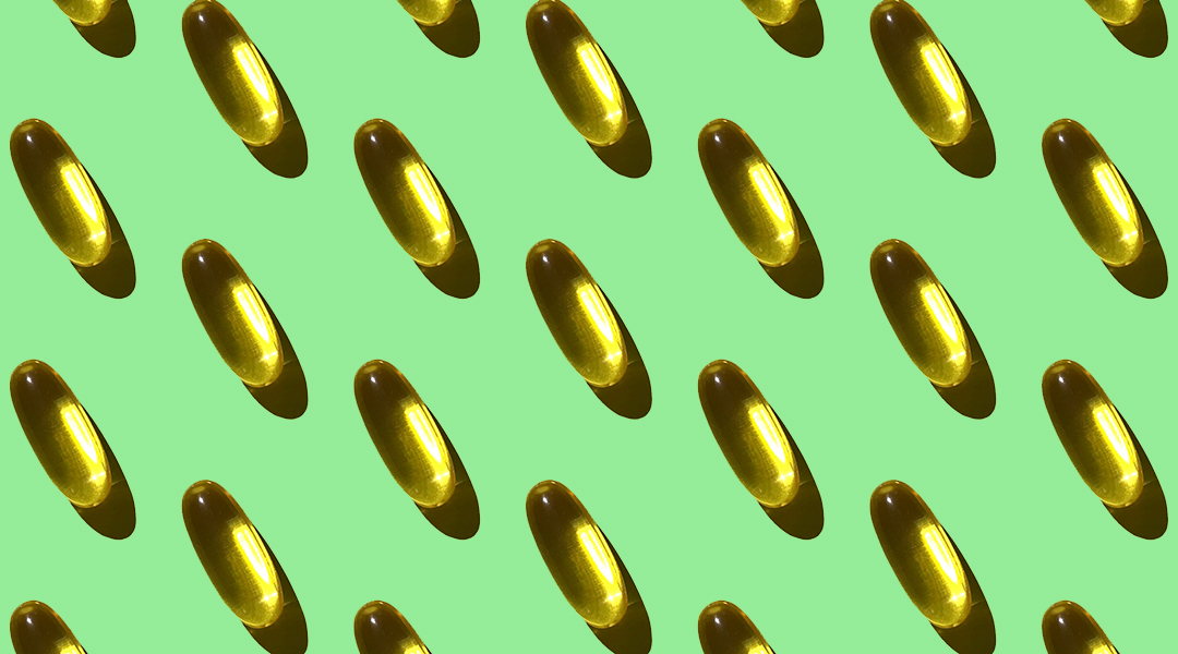 Pills on a green background.