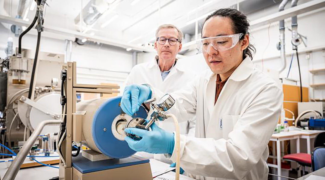 Researchers in the lab creating goldene.