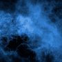Abstract image of a blue liquid on a black background
