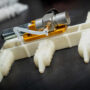Soft robot with gas cylinder as power source.
